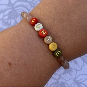 NWT Handmade stretchy beaded Auntie tan glass bead bracelet